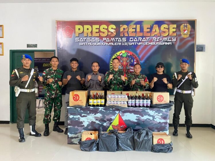 Satgas Pamtas RI–Malaysia Amankan Ratusan Botol Miras Ilegal di Perbatasan Sebatik
