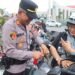 Merah Putih Menyapa Warga Nunukan, Polres Bagikan 500 Bendera Jelang 17 Agustus