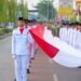 Dari TNI, Polri hingga Pelajar, Ratusan Warga Bentangkan Merah Putih 2.026 Meter